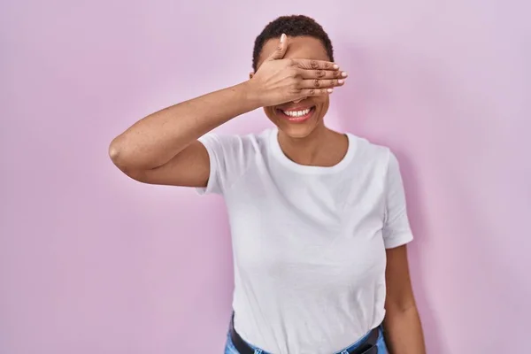 Beautiful African American Woman Standing Pink Background Smiling Laughing Hand — Stockfoto