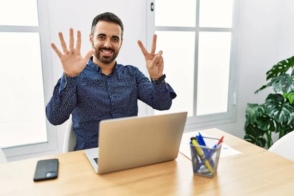 Young Hispanic Man Beard Working Office Laptop Showing Pointing Fingers — Stock Fotó