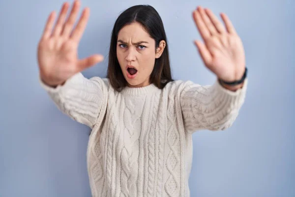 Young Brunette Woman Standing Blue Background Doing Stop Gesture Hands — Stock Photo, Image