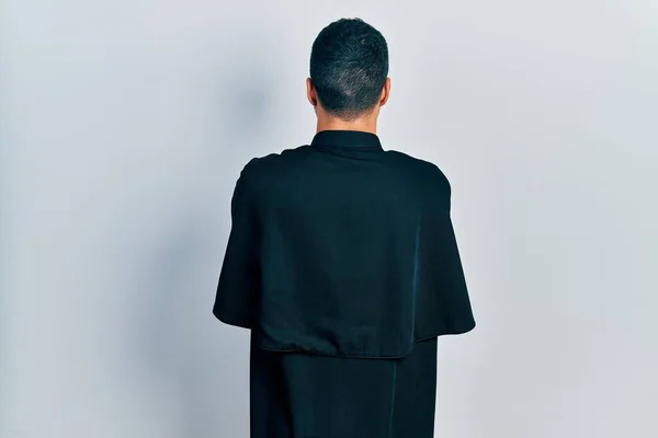 Handsome Hispanic Man Beard Wearing Catholic Priest Robe Standing Backwards — Φωτογραφία Αρχείου
