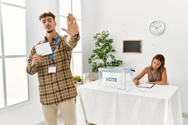 Young Handsome Man Voting Putting Envelop Ballot Box Open Hand — Fotografia de Stock