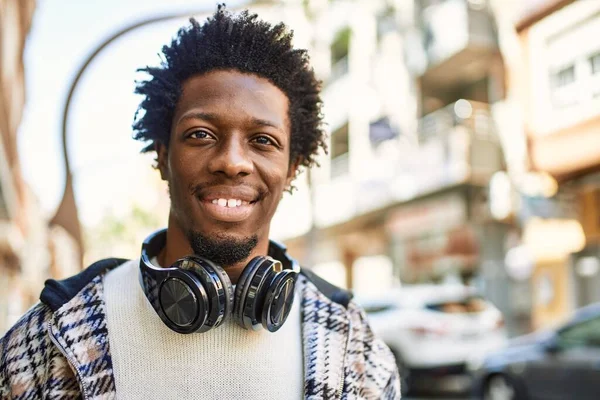 Handsome Black Man Afro Hair Wearing Headphones Smiling Happy Outdoors — Stock Photo, Image