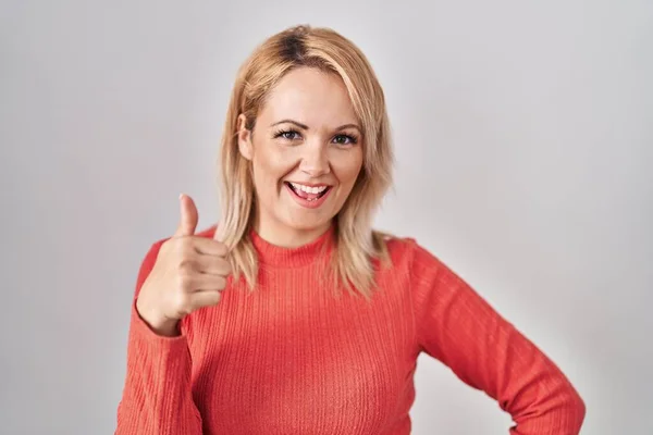 Blonde Woman Standing Isolated Background Doing Happy Thumbs Gesture Hand — Stockfoto