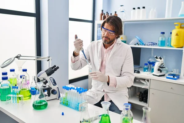Handsome Middle Age Man Working Scientist Laboratory Smiling Happy Pointing — Stok fotoğraf