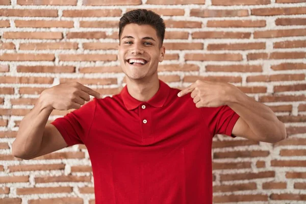 Young Hispanic Man Standing Bricks Wall Looking Confident Smile Face — Stok fotoğraf
