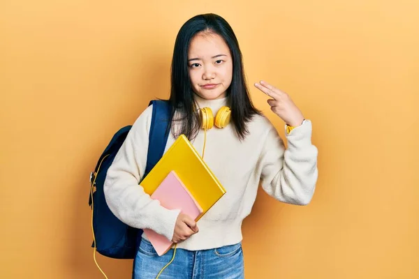 Young Chinese Girl Holding Student Backpack Books Shooting Killing Oneself — Fotografia de Stock