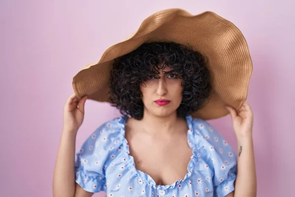 Young Brunette Woman Curly Hair Wearing Summer Hat Skeptic Nervous — Foto de Stock
