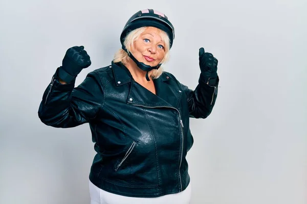 Middle Age Blonde Woman Holding Motorcycle Helmet Showing Arms Muscles — Foto Stock