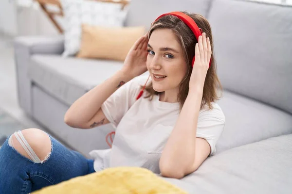 Young Woman Listening Music Sitting Floor Home — Stockfoto