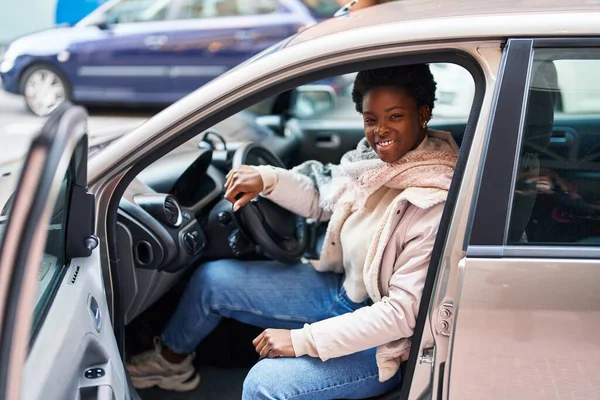 African American Woman Smiling Confident Sitting Car Street — Foto Stock