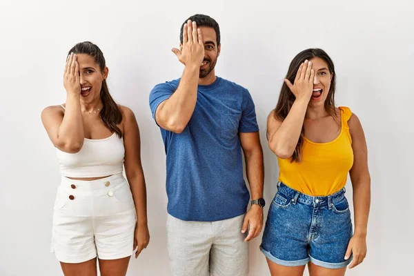 Group Young Hispanic People Standing Isolated Background Covering One Eye — Stockfoto