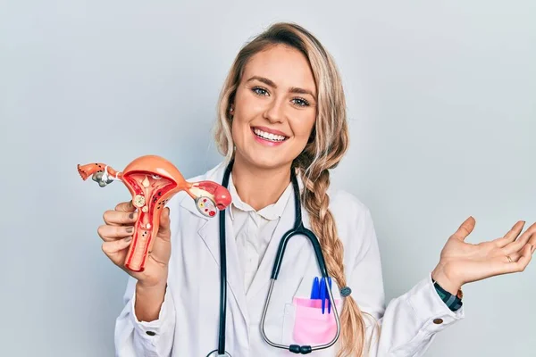Beautiful Young Blonde Woman Holding Anatomical Model Female Genital Organ — Stockfoto