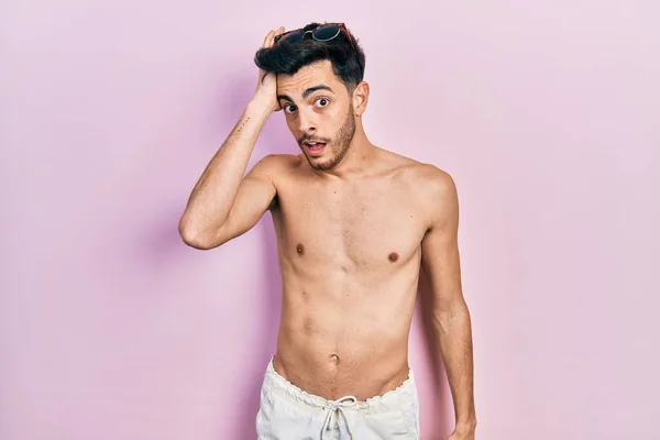 Young Hispanic Man Wearing Swimwear Shirtless Surprised Hand Head Mistake — Stock Photo, Image