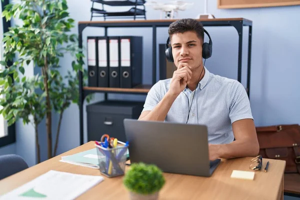 Young Hispanic Man Working Office Wearing Headphones Looking Confident Camera — Fotografia de Stock
