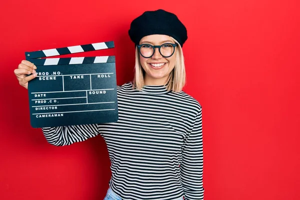 Beautiful Blonde Woman Holding Video Film Clapboard Looking Positive Happy — Photo