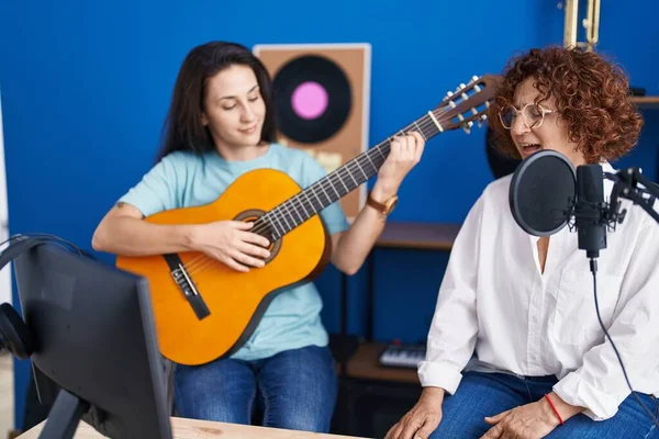 Two Women Musicians Singing Song Playing Classical Guitar Music Studio — Stockfoto