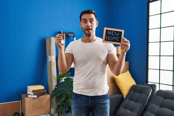 Young Hispanic Man Beard Holding Keys New Home Afraid Shocked — Stock Photo, Image