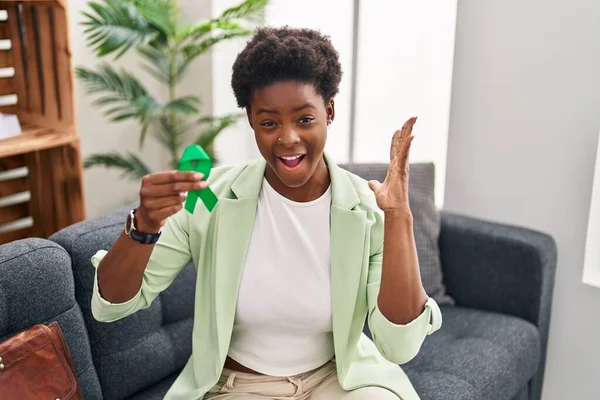 African American Woman Holding Support Green Ribbon Celebrating Victory Happy — Stock Photo, Image