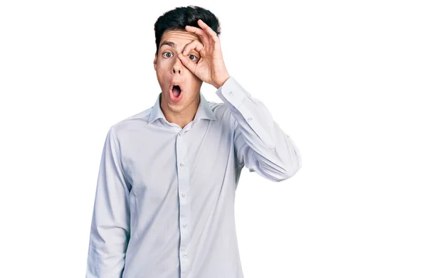 Young Hispanic Business Man Wearing Business Clothes Doing Gesture Shocked — 스톡 사진