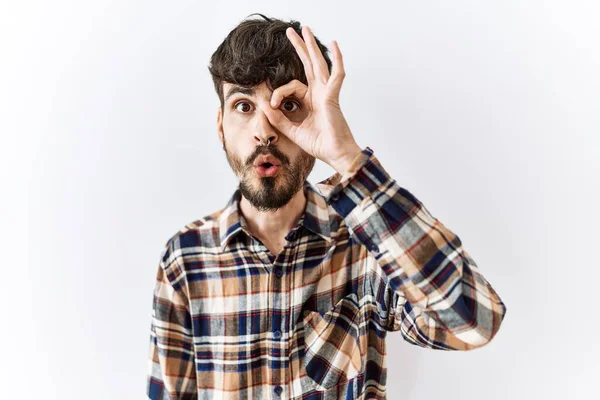 Hispanic Man Beard Standing Isolated Background Doing Gesture Shocked Surprised — Fotografia de Stock