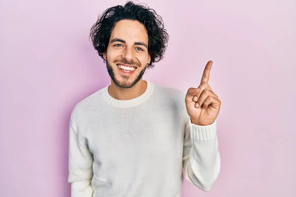 Handsome Hispanic Man Wearing Casual White Sweater Pointing Finger Successful — Stock Photo, Image