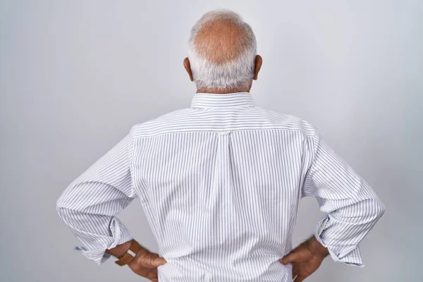 Senior Man Grey Hair Standing Isolated Background Standing Backwards Looking — Fotografia de Stock