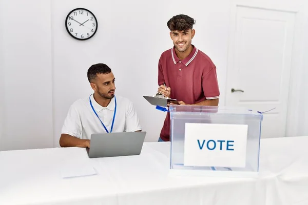 Two Hispanic Politic Party Workers Smiling Happy Working Electoral College — стоковое фото