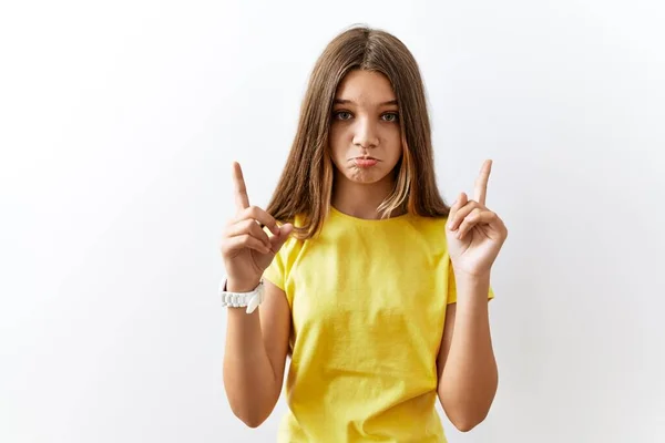 Young Brunette Teenager Standing Together Isolated Background Pointing Looking Sad — стоковое фото