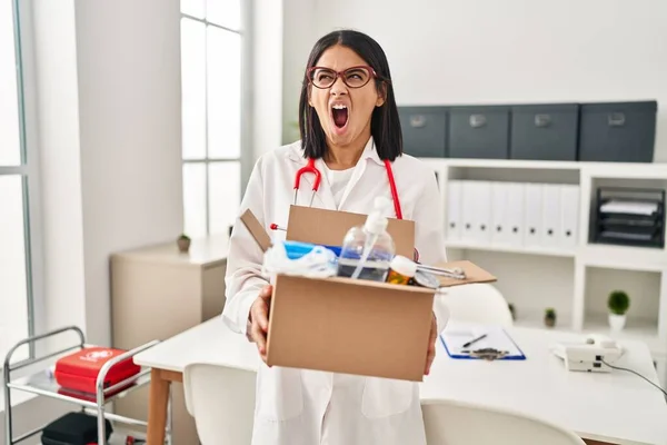 Young Hispanic Doctor Woman Holding Box Medical Items Angry Mad — Stock Photo, Image