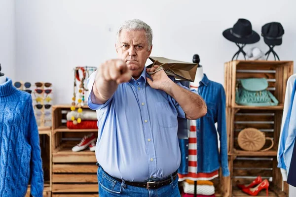 Senior Man Grey Hair Holding Shopping Bags Retail Shop Pointing — Stockfoto