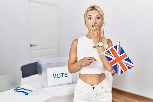 Young Caucasian Woman Political Campaign Election Holding Flag Covering Mouth —  Fotos de Stock