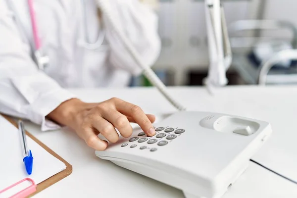 Young Woman Wearing Doctor Uniform Talking Telephone Clinic — Fotografia de Stock