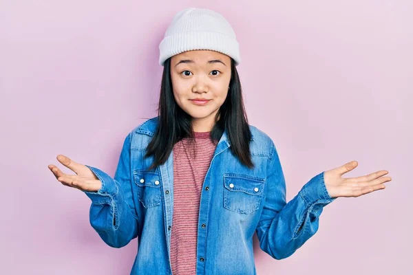 Young Chinese Girl Wearing Cute Wool Cap Clueless Confused Expression — 스톡 사진