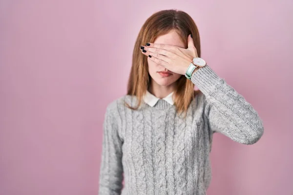 Beautiful Woman Standing Pink Background Covering Eyes Hand Looking Serious — Stock fotografie