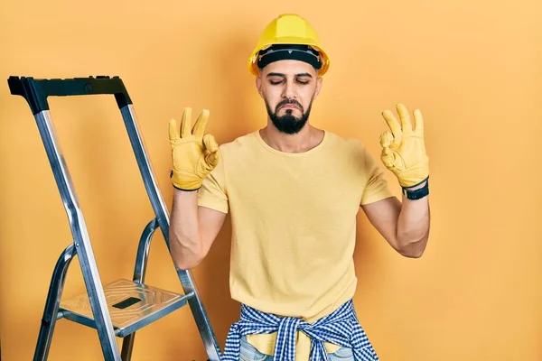 Handsome Man Beard Construction Stairs Wearing Hardhat Relaxed Smiling Eyes — 스톡 사진