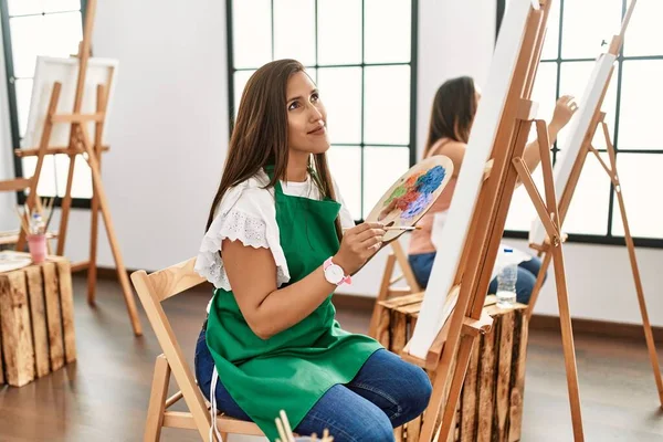 Young Hispanic Artist Women Painting Canvas Art Studio Smiling Looking — Stock Photo, Image