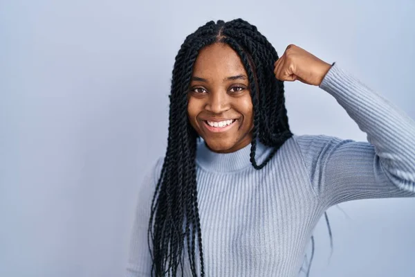 African American Woman Standing Blue Background Strong Person Showing Arm —  Fotos de Stock