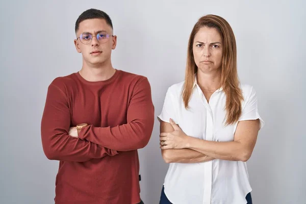 Mother Son Standing Together Isolated Background Skeptic Nervous Disapproving Expression — kuvapankkivalokuva