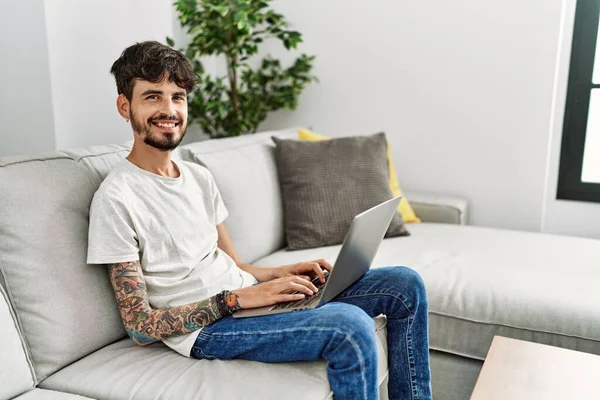 Hispanic Man Beard Sitting Sofa Happy Cool Smile Face Lucky — Stok fotoğraf