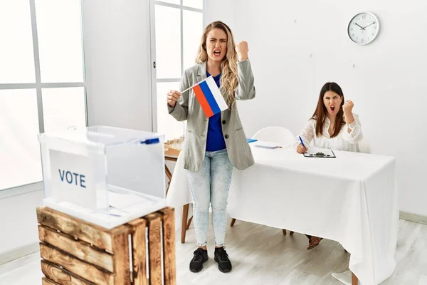 Young Blonde Woman Political Stand Holding Russia Flag Annoyed Frustrated — Stok fotoğraf