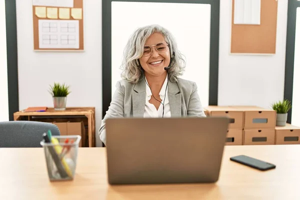 Middle Age Businesswoman Sitting Desk Working Using Laptop Office Winking — Photo