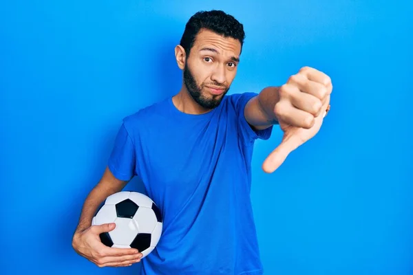 Hispanic Man Beard Holding Soccer Ball Looking Unhappy Angry Showing — Foto de Stock