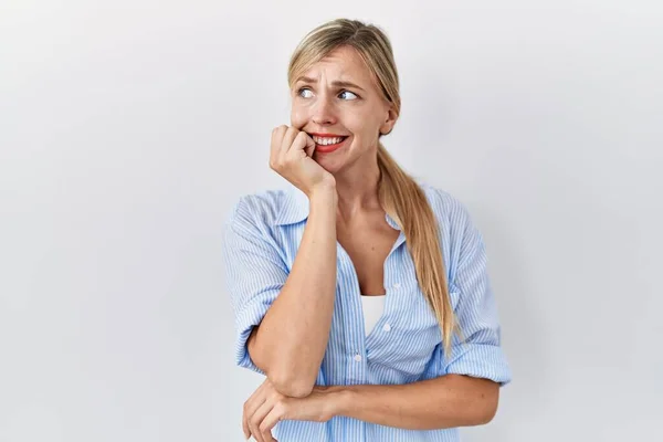 Beautiful Blonde Woman Standing White Background Looking Stressed Nervous Hands — 图库照片