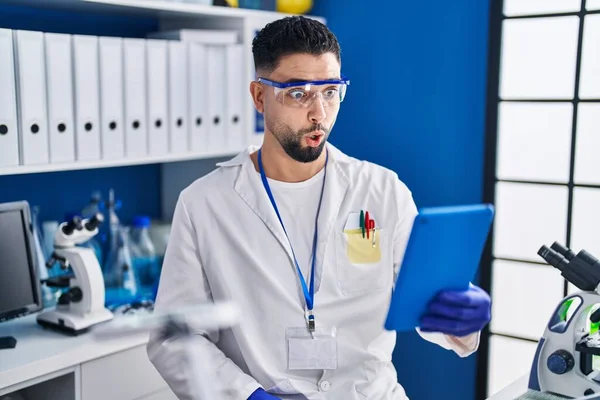 Young Handsome Man Working Scientist Laboratory Doing Online Call Scared — Stock Photo, Image