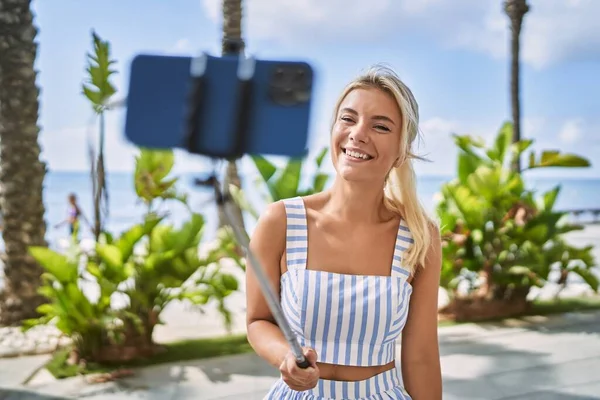 Young Blonde Girl Smiling Happy Making Selfie Smartphone Promenade —  Fotos de Stock