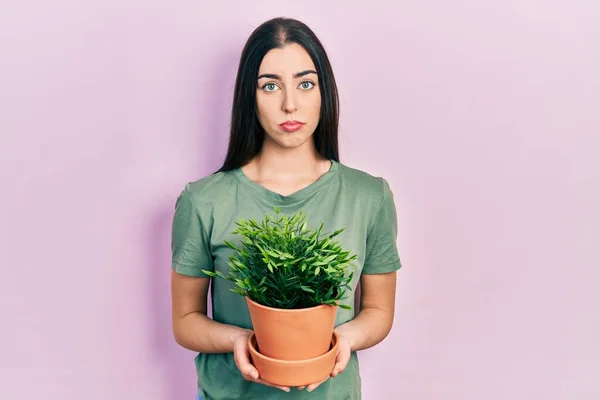 Beautiful Woman Blue Eyes Holding Green Plant Pot Depressed Worry — Foto Stock