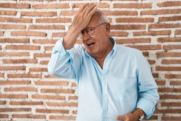 Senior Man Grey Hair Standing Bricks Wall Surprised Hand Head — стоковое фото