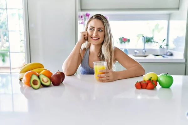 Young Woman Smiling Confident Holding Orange Juice Kitchen — 스톡 사진
