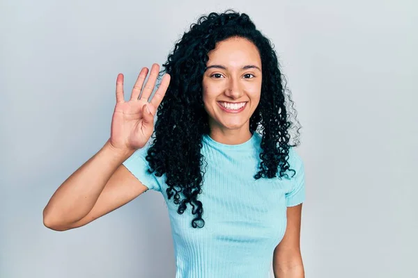 Young Hispanic Woman Curly Hair Wearing Casual Blue Shirt Showing — Stockfoto