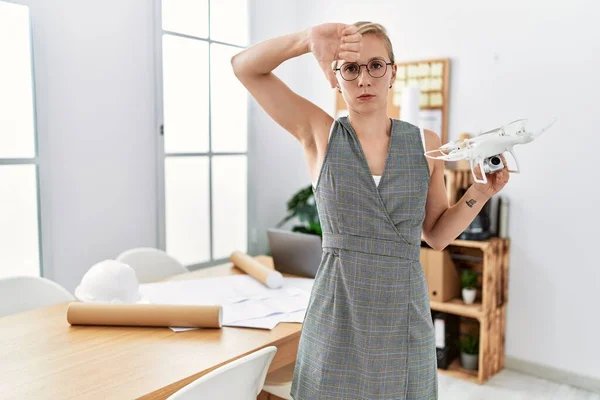 Young Blonde Woman Holding Drone Architect Office Angry Face Negative —  Fotos de Stock